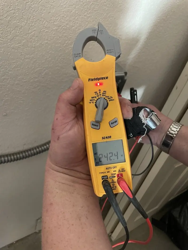 Voltage testing with clamp meter during Generator Installation in West Milford